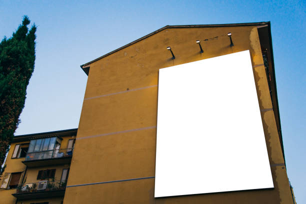Billboard on building A blank billboard on a residential building wild posting ad stock pictures, royalty-free photos & images