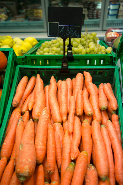 Some carrots in a supermarket