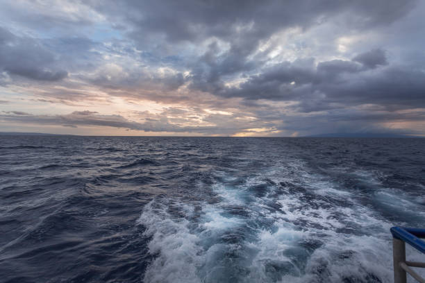 istock Boat at the Ocean with waves behind boat 669400120