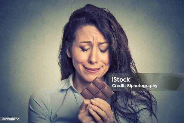 Sad Young Woman Tired Of Diet Restrictions Craving Sweets Chocolate Stock Photo - Download Image Now