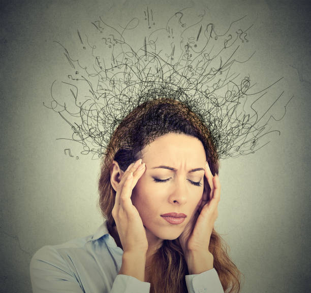 istock sad young woman with worried stressed face expression and brain melting into lines question marks 669400274