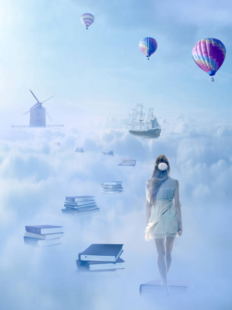 istock Woman walking down the book pass above clouds with windmill old ship in horizon 669402496