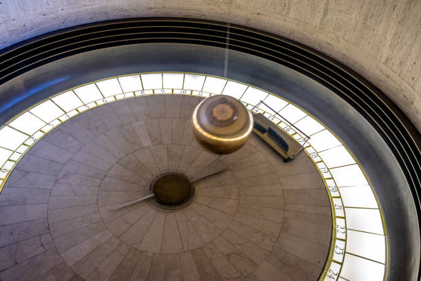 Vintage gravity driven clock tower mechanisms and dials.