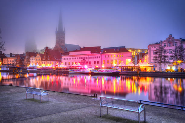 istock Old Town pier architecture in Lubeck at night 669403862