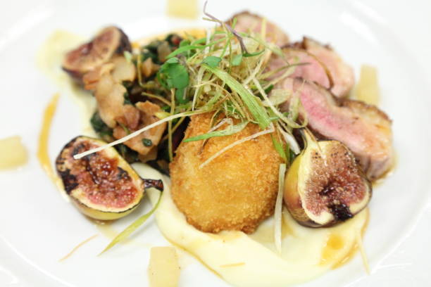 istock Duck breast, fresh fig, collard greens, swiss chard, bacon. 669406268