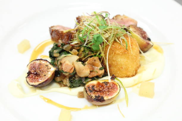istock Duck breast, fresh fig, collard greens, swiss chard, bacon. 669406298
