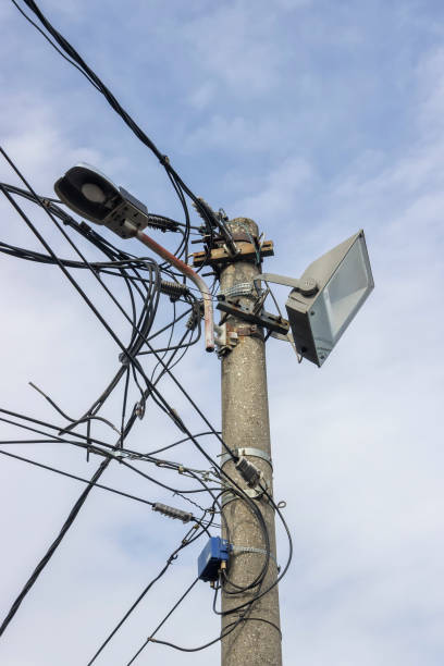 istock Concrete Electrical Pole With Street Lamps 669406426