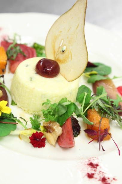 istock Goat cheese herbs flan, fall salad, beets, roasted beets, butternut squash, greens, pear, walnuts. 669406536