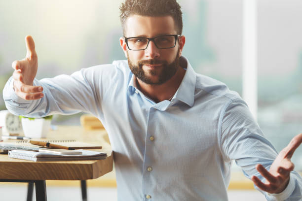 istock Excited businessman at workplace 669406836