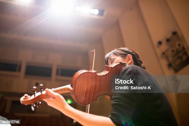 Woman Playing Violin Stock Photo - Download Image Now - Violin, Playing, Performance