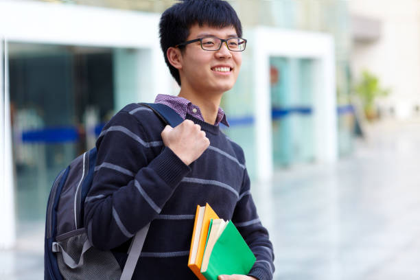 istock One young asian college student study in the library 669412756