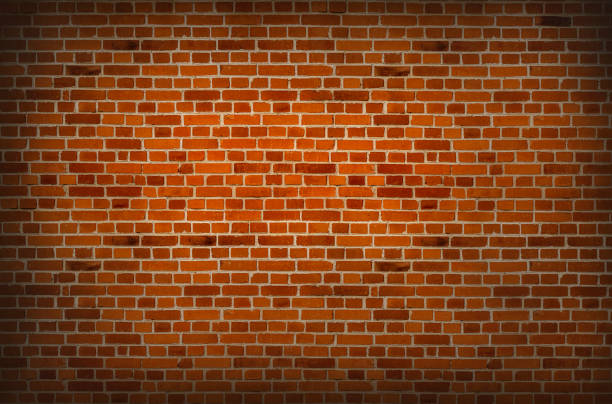 istock old dark brown and red brick wall background, 669413010