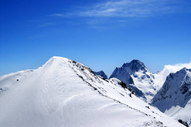 Slope for freeriding in sun winter day. Caucasus, region Dombay, top of mount Musa Achitara.
