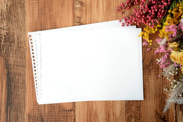 istock Sketch book on wooden board 669430170