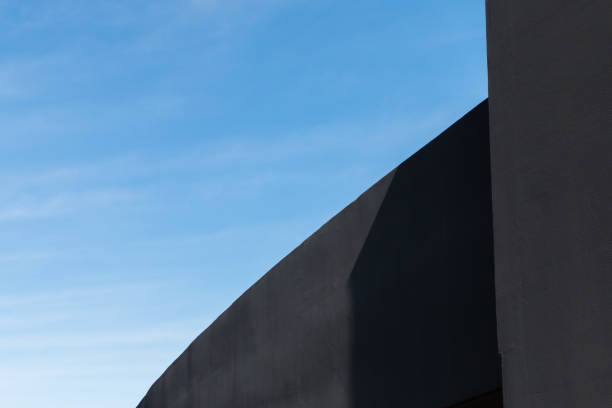 istock Black roof and blue sky 669433768