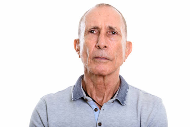istock Close up of senior man looking at camera 669434164