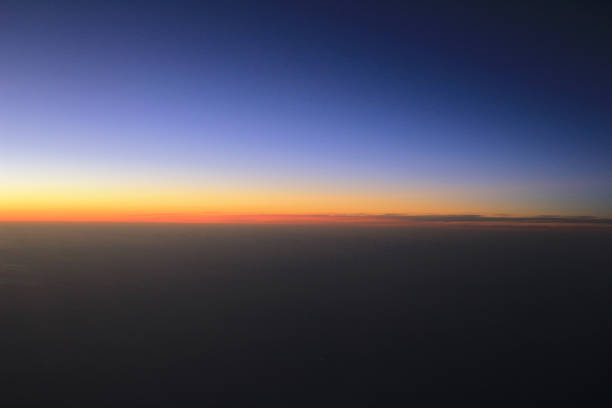 istock Amazing view from plane on the sky, sunset sun and clouds 669437272
