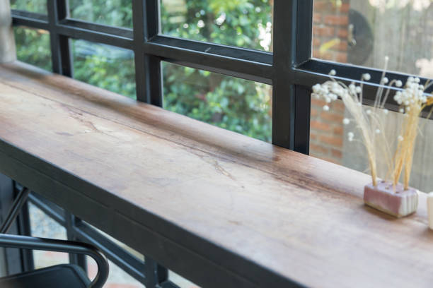 istock the empty wooden counter near grass window 669437650