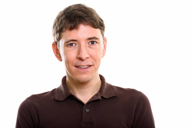 istock Studio shot of happy man smiling against white background 669437870