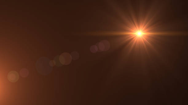 istock Lens flare light  over black background. Easy to add  overlay or screen filter over photos 669438418