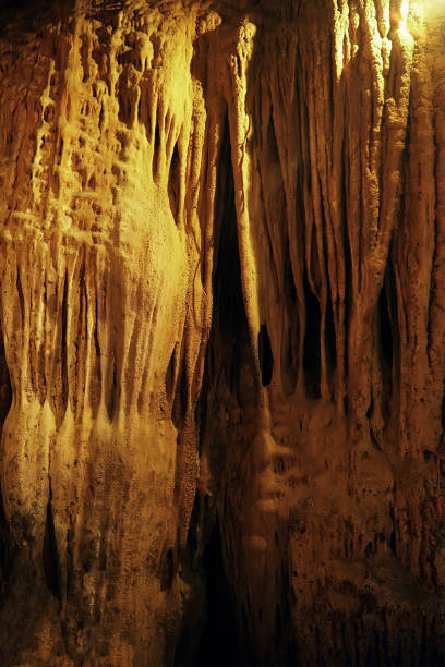 istock mystery hanging stalactite in cave 669440082