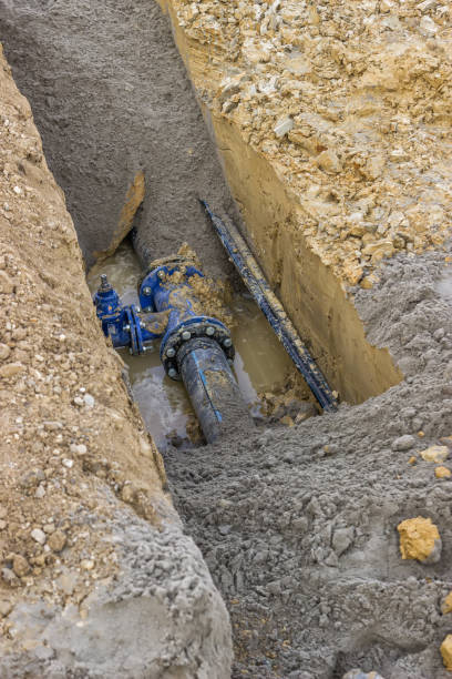 istock Hole in the ground with water pipe 669441554