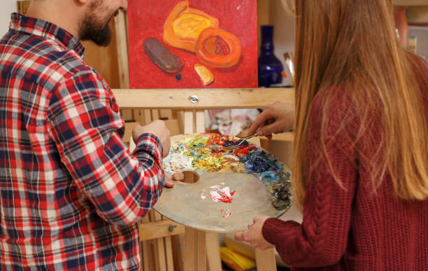 istock Artist with palette knife 669444050