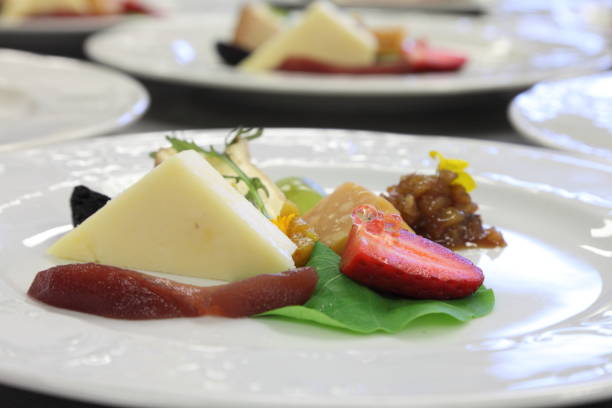 istock Cheese course, aged gouda, taleggio, parmesan, fig, pear, grape, relish, compote, strawberry, pearls. 669449090