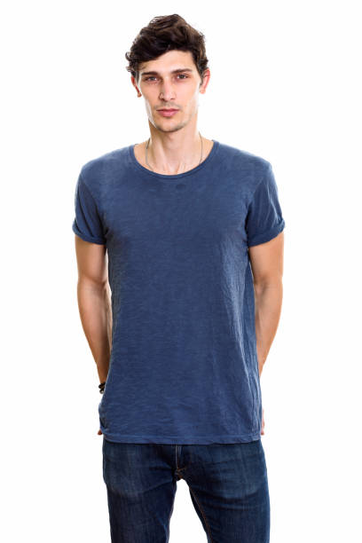 istock Studio shot of young handsome man standing with hands on back pocket 669459176
