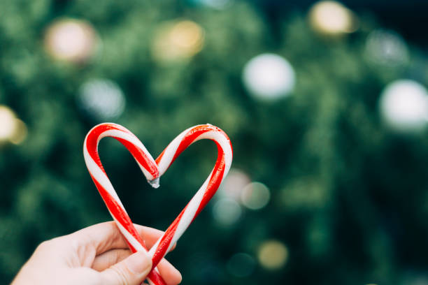 istock Candy canes in the shape of heart 669459204
