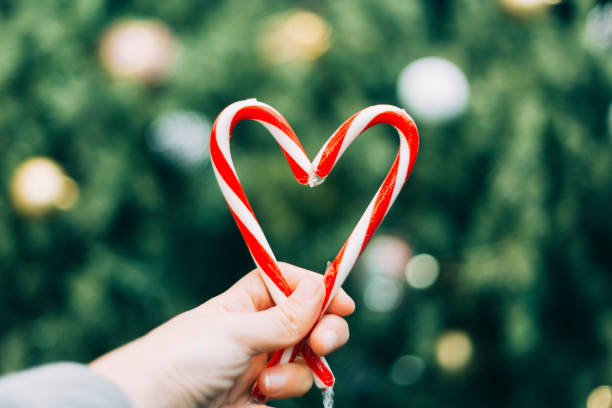 istock Candy canes in the shape of heart 669459220