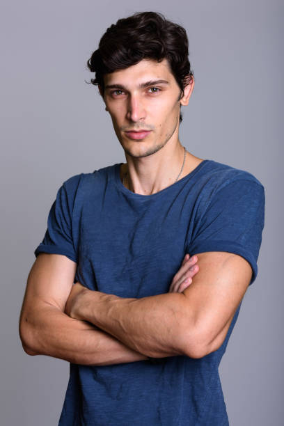 istock Studio shot of young handsome man with arms crossed 669459420