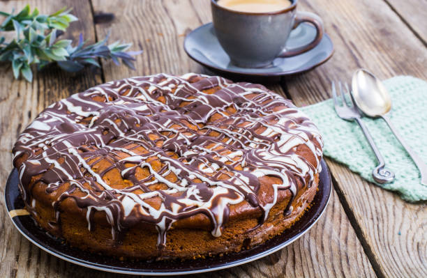istock Sponge cake with icing of white and dark chocolate 669466256