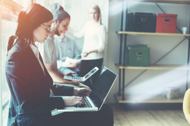 istock Young business team working in loft office 669467220