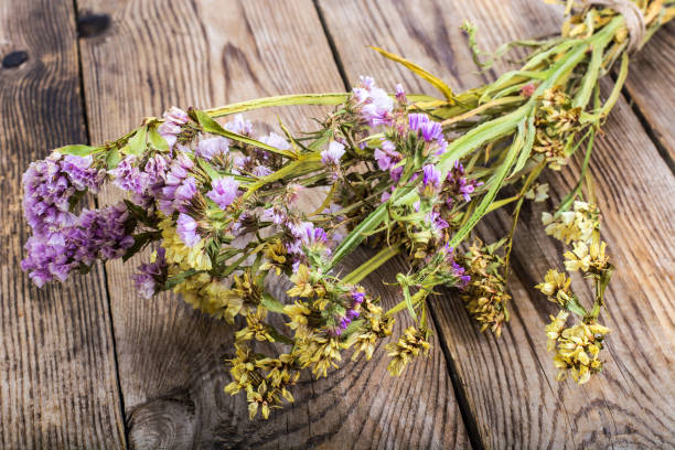 istock Dried flowers Limonium on wooden background 669469742