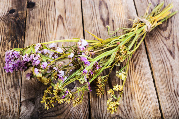 istock Dried flowers Limonium on wooden background 669469776