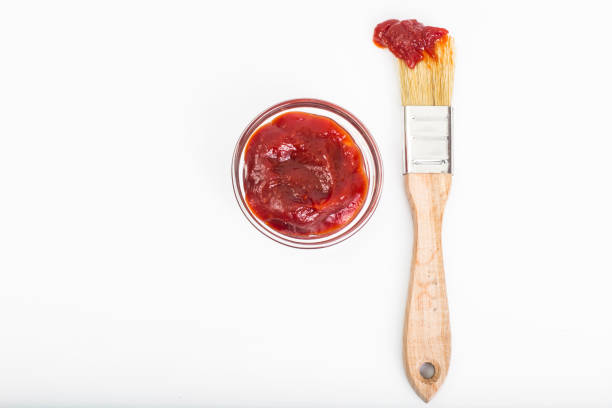 istock Abstract brush ketchup on white background 669474462
