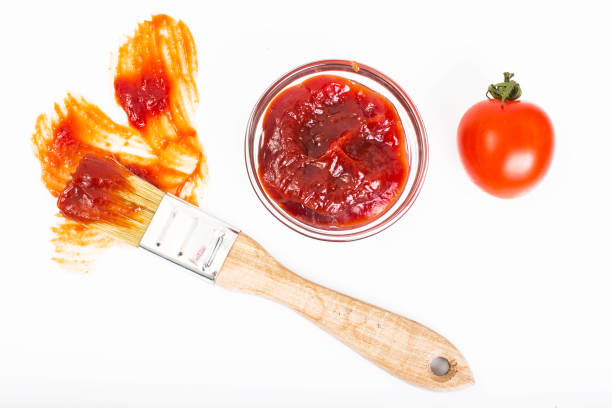 istock Abstract brush ketchup on white background 669474520