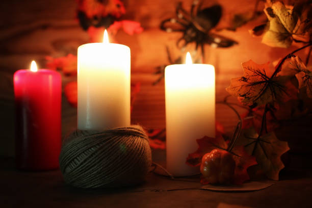 istock table decorations for Halloween carved pumpkin head candles 669477064