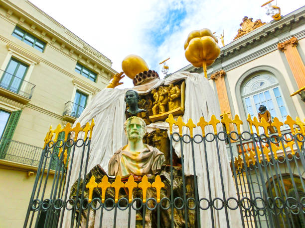 Figueres, Spain - September 15, 2015: The Monument to the Catalan philosopher Francesc Puzholsu in front of the theater and the museum of Salvador Dali in Figueres, Spain on September 15, 2015