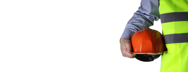 istock man in suit with helmet closeup 669488058
