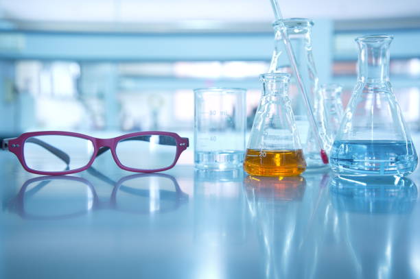 istock red eye glasses in science laboratory background with flask 669488590