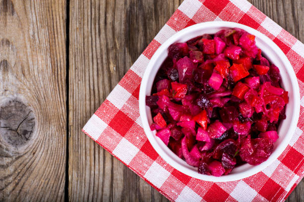istock Vegetable salad with beetroot in white salad bowl 669489042