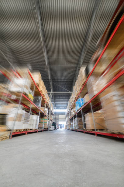 istock Long shelves with a variety of boxes and containers 669489084