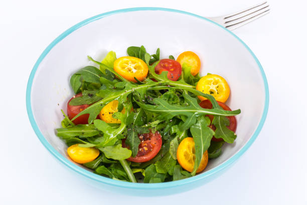 istock Healthy eating vegan vegetable salad on white background 669495720