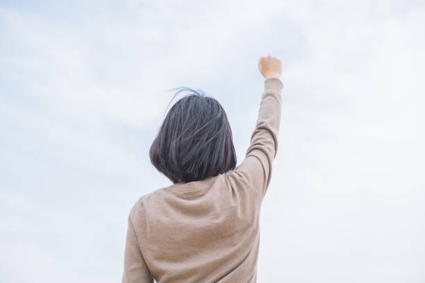istock Woman and blue sky 669498198