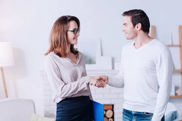 istock Positive delighted man greeting his psychologist 669498932