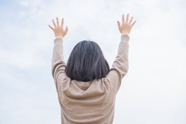 istock Woman and blue sky 669499004