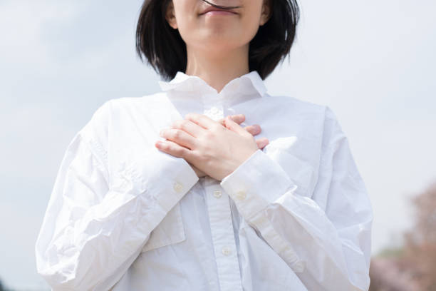 istock White shirt woman and blue sky 669499144