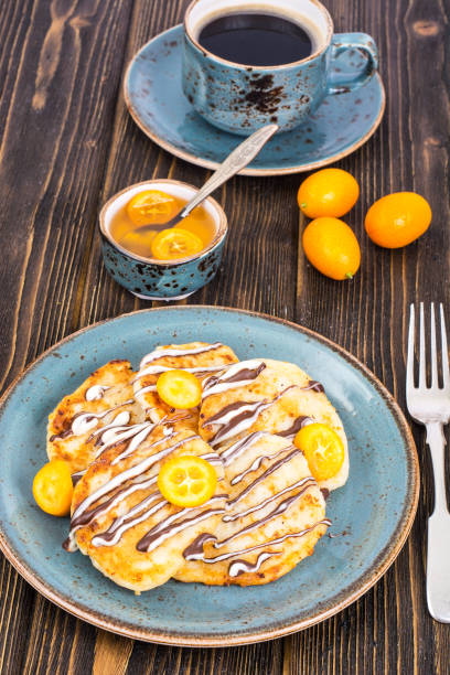 istock Pancakes with chocolate and kumquats 669499562